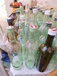 Steklenice 1 l in 0,75 l, večje število, prozorne, z pokrovom na vijak