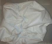 Bela nepremočljiva zaščita za otroško posteljico 60x120 cm, z elastiko